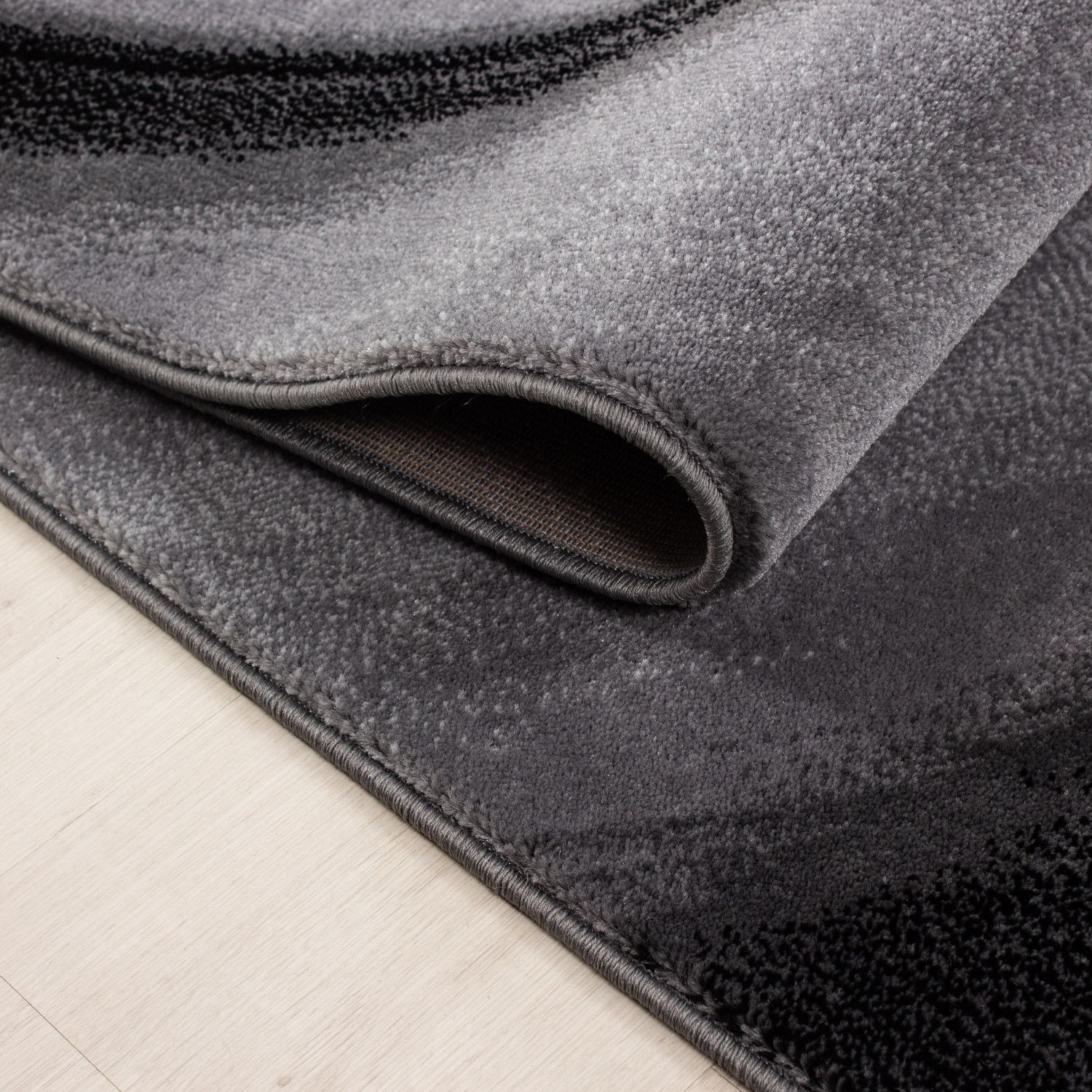 Kurzflor Teppich: Sanftes Wellenmuster in Schwarz - Image 5